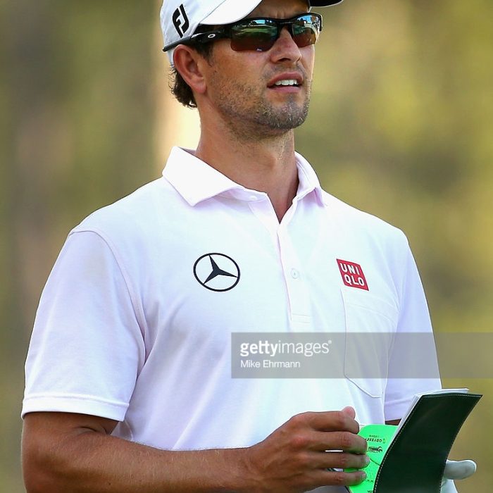 Adam Scott with a StrackaBook during a practice round prior to the start of the 114th U.S. Open at Pinehurst No. 2 on June 10, 2014